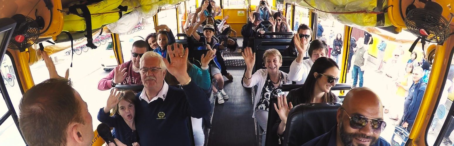 happy customers on a london duck tour